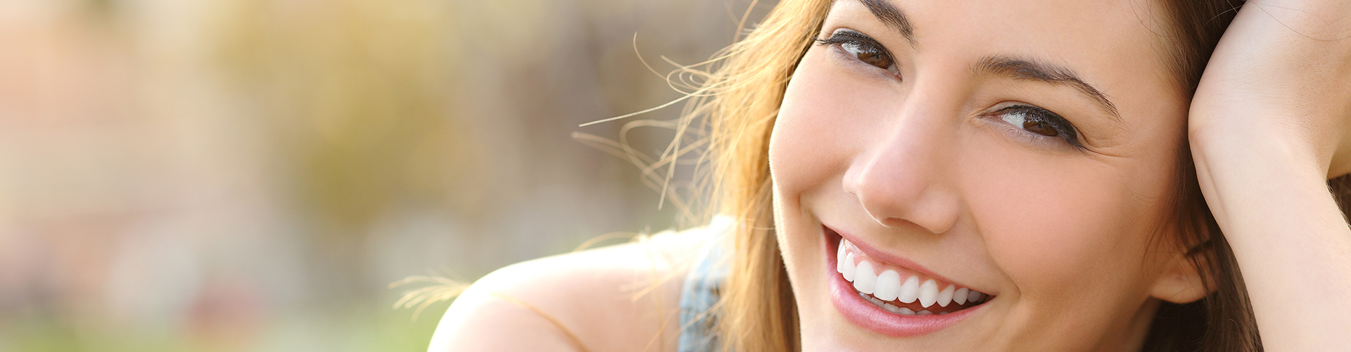 Young Woman Smiling with Bright White Teeth